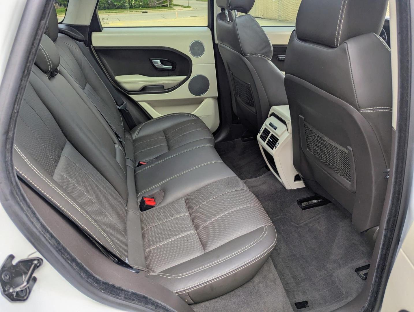 2015 White /Tan/Ivory/Espresso Land Rover Range Rover Evoque Prestige Premium 5-Door (SALVV2BG5FH) with an 2.0L L4 DOHC 24V TURBO engine, 9-Speed Automatic transmission, located at 603 Amelia Street, Plymouth, MI, 48170, (734) 459-5520, 42.378841, -83.464546 - Photo#9