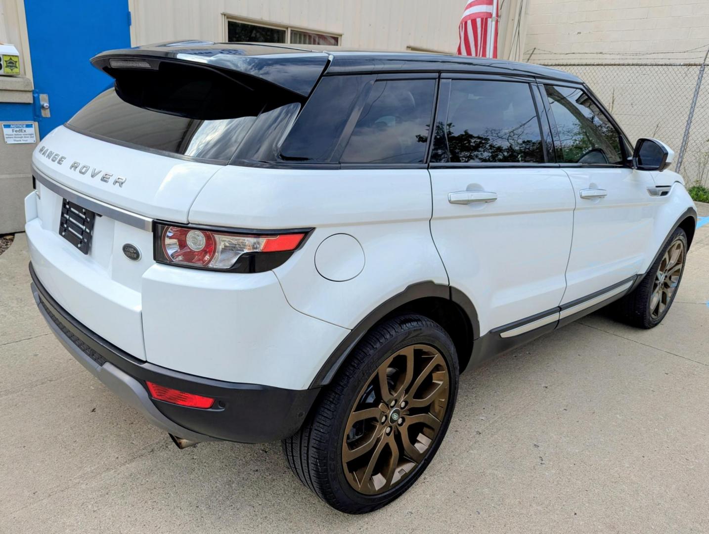 2015 White /Tan/Ivory/Espresso Land Rover Range Rover Evoque Prestige Premium 5-Door (SALVV2BG5FH) with an 2.0L L4 DOHC 24V TURBO engine, 9-Speed Automatic transmission, located at 603 Amelia Street, Plymouth, MI, 48170, (734) 459-5520, 42.378841, -83.464546 - Photo#13