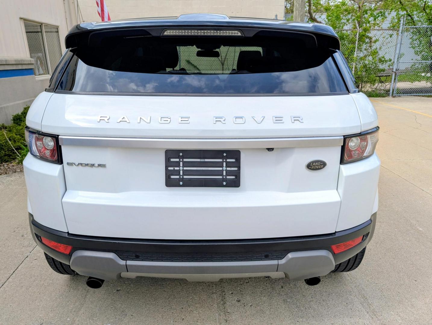 2015 White /Tan/Ivory/Espresso Land Rover Range Rover Evoque Prestige Premium 5-Door (SALVV2BG5FH) with an 2.0L L4 DOHC 24V TURBO engine, 9-Speed Automatic transmission, located at 603 Amelia Street, Plymouth, MI, 48170, (734) 459-5520, 42.378841, -83.464546 - Photo#14