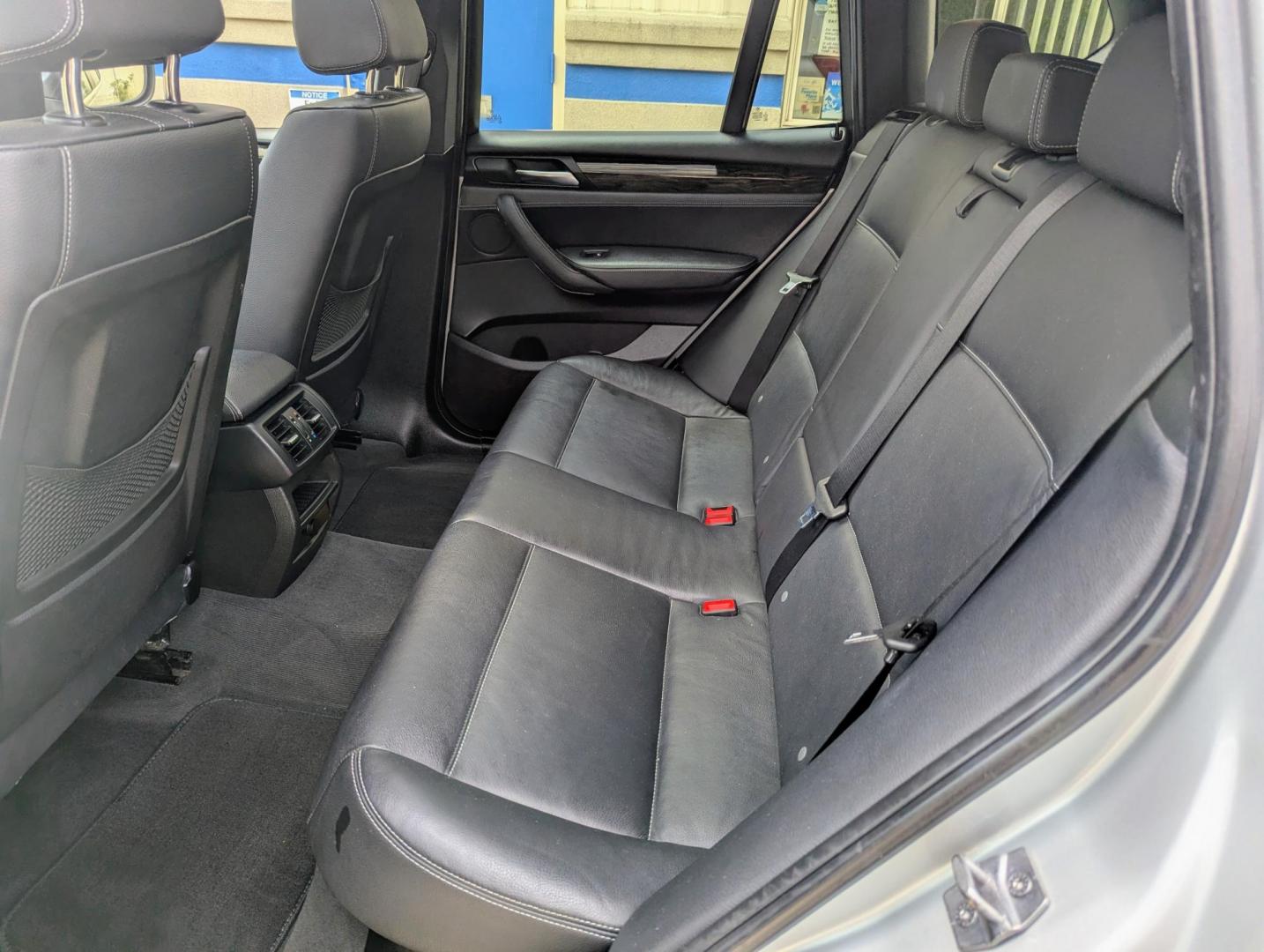 2013 Silver Metallic /Black Leather BMW X3 xDrive28i (5UXWX9C53D0) with an 3.0L L6 DOHC 24V engine, 8-Speed Automatic transmission, located at 603 Amelia Street, Plymouth, MI, 48170, (734) 459-5520, 42.378841, -83.464546 - Vehicles shown by appointment - Please call ahead - 734-459-5520, text 734-658-4573 or contact us via our web site at: http://www.selectmotors.com for complete Inventory, Photos, Videos and FREE Carfax Reports. 2013 BMW X3 xDrive28i – Loaded & Meticulously Maintained Price: $9,995 (Warranty & - Photo#5