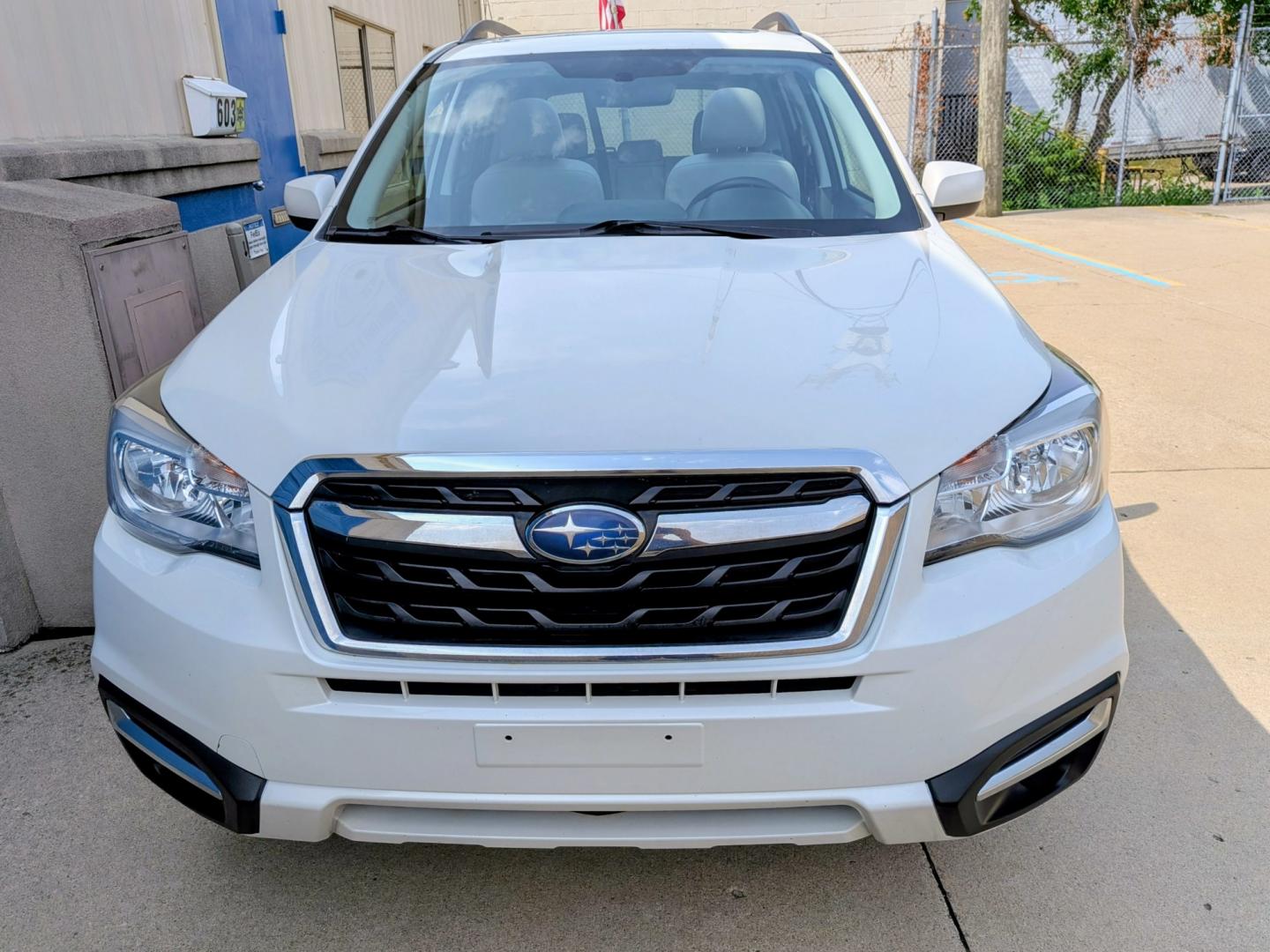 2018 White /Grey Subaru Forester 2.5i Premium CVT (JF2SJAEC7JH) with an 2.5L H4 SOHC 16V engine, CVT transmission, located at 603 Amelia Street, Plymouth, MI, 48170, (734) 459-5520, 42.378841, -83.464546 - Vehicles shown by appointment - Please call ahead - 734-459-5520, text 734-658-4573 or contact us via our web site at: http://www.selectmotors.com for complete Inventory, Photos, Videos and FREE Carfax Reports. 2018 Subaru Forester 2.5i Premium CVT Price: $13,995 Mileage: 109,000 miles Col- Photo#1
