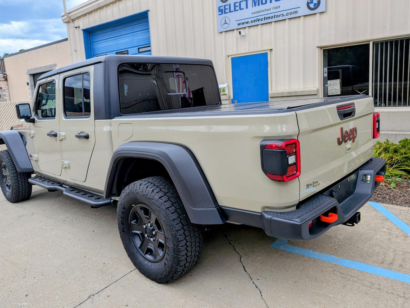 2022 Gobi /Black Jeep Gladiator Mojave (1C6JJTEG8NL) with an 3.6L V6 DOHC 24V engine, 6M transmission, located at 603 Amelia Street, Plymouth, MI, 48170, (734) 459-5520, 42.378841, -83.464546 - Vehicles shown by appointment - Please call ahead - 734-459-5520, text 734-658-4573 or contact us via our web site at: http://www.selectmotors.com for complete Inventory, Photos, Videos and FREE Carfax Reports. FOR SALE: 2022 Jeep Gladiator Mojave 4x4 Price: $29,995 | Limited Edition Gobi Clea- Photo#3
