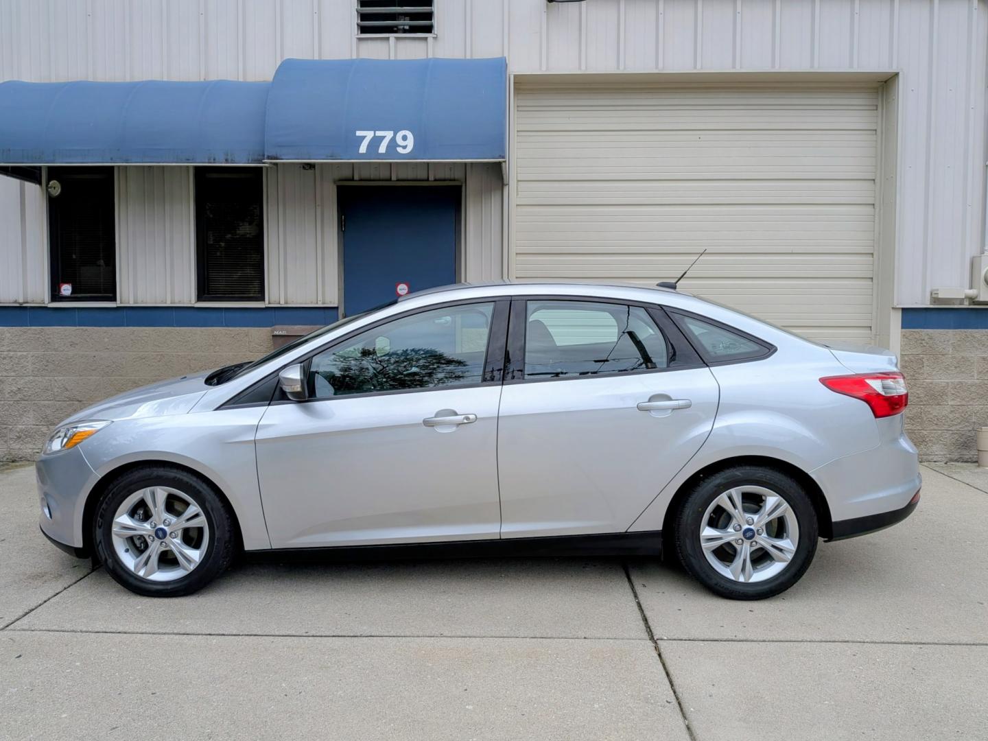2014 Silver /Black Ford Focus SE Sedan (1FADP3F21EL) with an 2.0L L4 DOHC 16V engine, Automatic transmission, located at 603 Amelia Street, Plymouth, MI, 48170, (734) 459-5520, 42.378841, -83.464546 - Vehicles shown by appointment - Please call ahead - 734-459-5520, text 734-658-4573 or contact us via our web site at: http://www.selectmotors.com for complete Inventory, Photos, Videos and FREE Carfax Reports. 2014 Ford Focus SE Sedan – Only 32k Miles! Price: $8,995 (Includes Document Fee- Photo#1