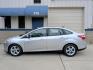2014 Silver /Black Ford Focus SE Sedan (1FADP3F21EL) with an 2.0L L4 DOHC 16V engine, Automatic transmission, located at 603 Amelia Street, Plymouth, MI, 48170, (734) 459-5520, 42.378841, -83.464546 - Vehicles shown by appointment - Please call ahead - 734-459-5520, text 734-658-4573 or contact us via our web site at: http://www.selectmotors.com for complete Inventory, Photos, Videos and FREE Carfax Reports. 2014 Ford Focus SE Sedan – Only 32k Miles! Price: $8,995 (Includes Document Fee- Photo#1
