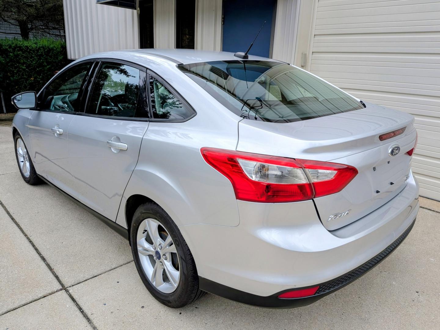 2014 Silver /Black Ford Focus SE Sedan (1FADP3F21EL) with an 2.0L L4 DOHC 16V engine, Automatic transmission, located at 603 Amelia Street, Plymouth, MI, 48170, (734) 459-5520, 42.378841, -83.464546 - Vehicles shown by appointment - Please call ahead - 734-459-5520, text 734-658-4573 or contact us via our web site at: http://www.selectmotors.com for complete Inventory, Photos, Videos and FREE Carfax Reports. 2014 Ford Focus SE Sedan – Only 32k Miles! Price: $8,995 (Includes Document Fee- Photo#2