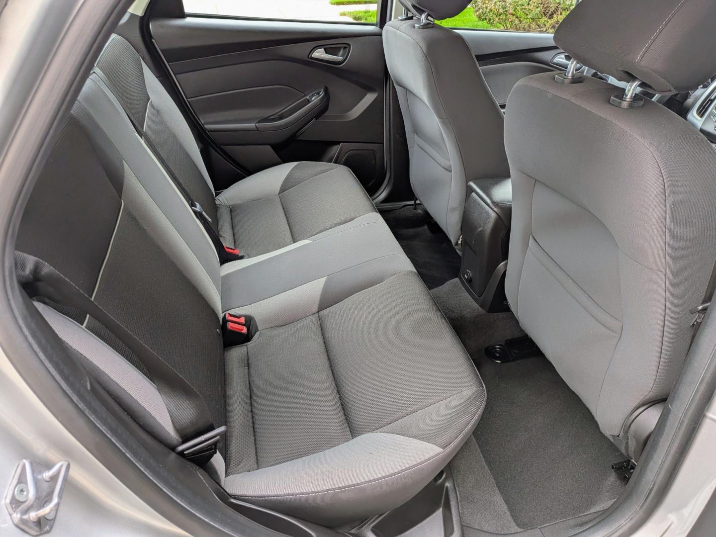 2014 Silver /Black Ford Focus SE Sedan (1FADP3F21EL) with an 2.0L L4 DOHC 16V engine, Automatic transmission, located at 603 Amelia Street, Plymouth, MI, 48170, (734) 459-5520, 42.378841, -83.464546 - Vehicles shown by appointment - Please call ahead - 734-459-5520, text 734-658-4573 or contact us via our web site at: http://www.selectmotors.com for complete Inventory, Photos, Videos and FREE Carfax Reports. 2014 Ford Focus SE Sedan – Only 32k Miles! Price: $8,995 (Includes Document Fee- Photo#6