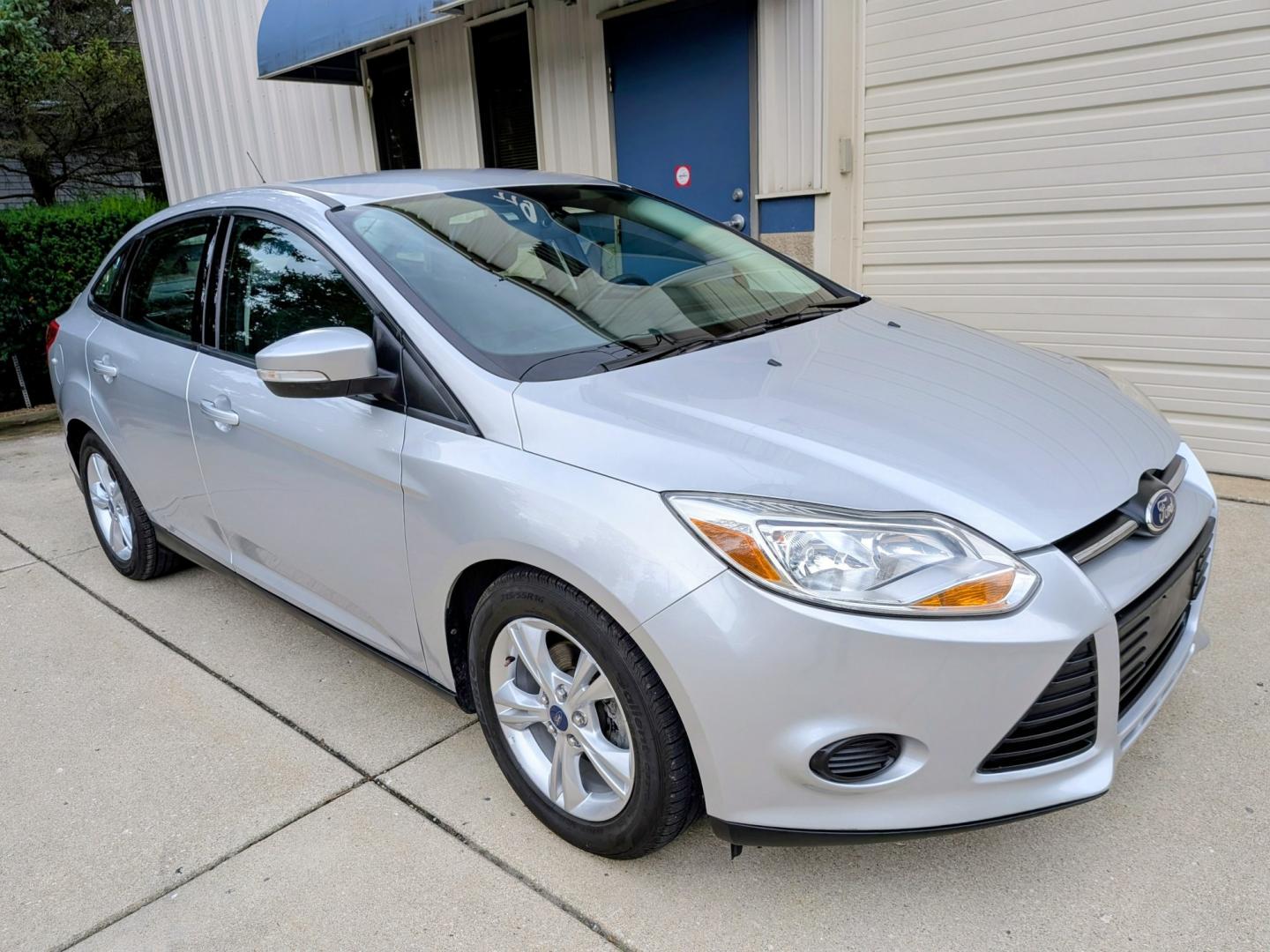 2014 Silver /Black Ford Focus SE Sedan (1FADP3F21EL) with an 2.0L L4 DOHC 16V engine, Automatic transmission, located at 603 Amelia Street, Plymouth, MI, 48170, (734) 459-5520, 42.378841, -83.464546 - Vehicles shown by appointment - Please call ahead - 734-459-5520, text 734-658-4573 or contact us via our web site at: http://www.selectmotors.com for complete Inventory, Photos, Videos and FREE Carfax Reports. 2014 Ford Focus SE Sedan – Only 32k Miles! Price: $8,995 (Includes Document Fee- Photo#10