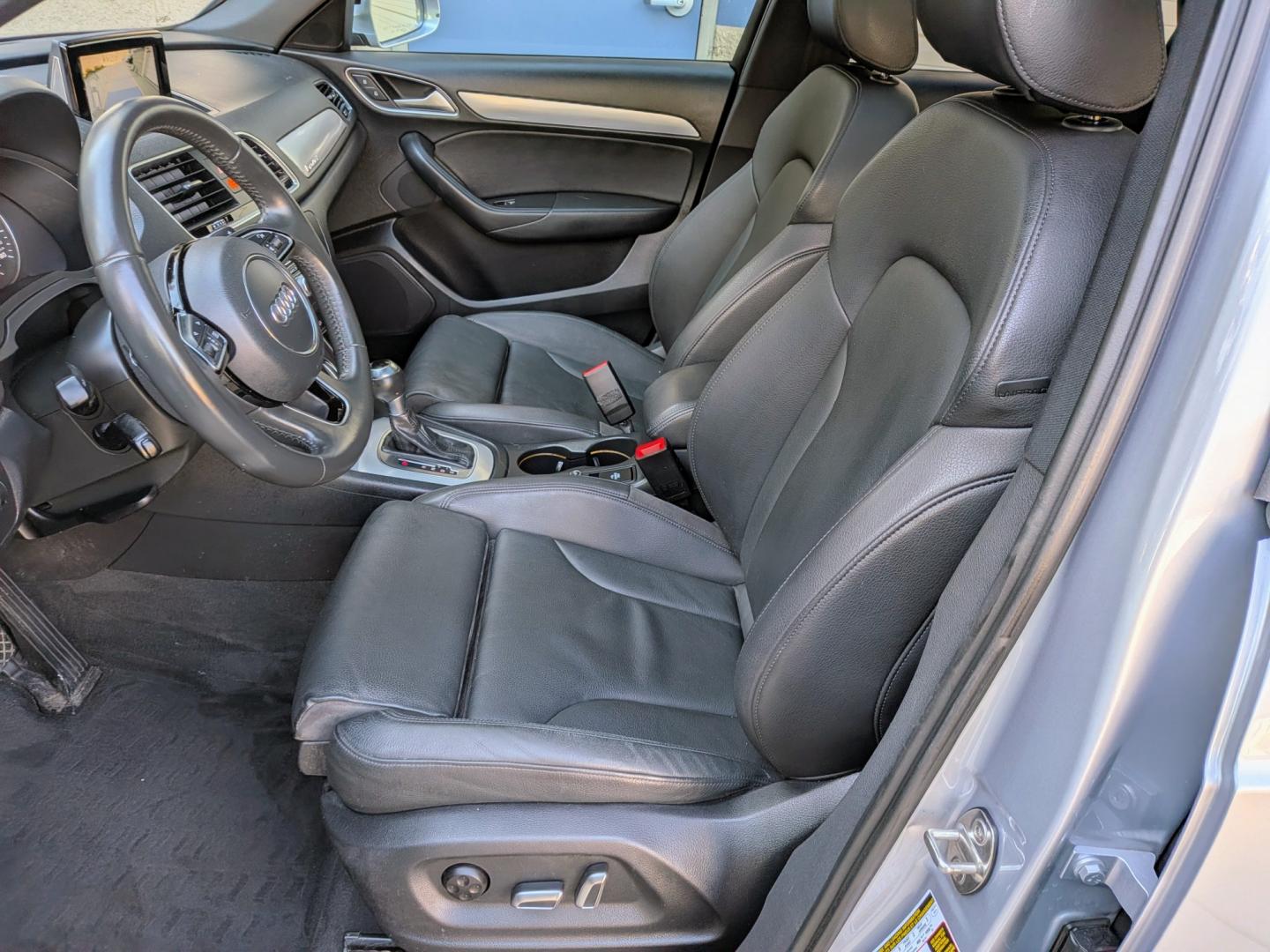 2018 Silver Metallic /Black Leather Audi Q3 Premium Plus quattro (WA1JCCFS1JR) with an 2.0L L4 DOHC 24V engine, 6A transmission, located at 603 Amelia Street, Plymouth, MI, 48170, (734) 459-5520, 42.378841, -83.464546 - Vehicles shown by appointment - Please call ahead - 734-459-5520, text 734-658-4573 or contact us via our web site at: http://www.selectmotors.com for complete Inventory, Photos, Videos and FREE Carfax Reports. 2018 Audi Q3 Premium Plus AWD (S Line Sport) Price: $12,995 (Includes Document Fee &- Photo#4