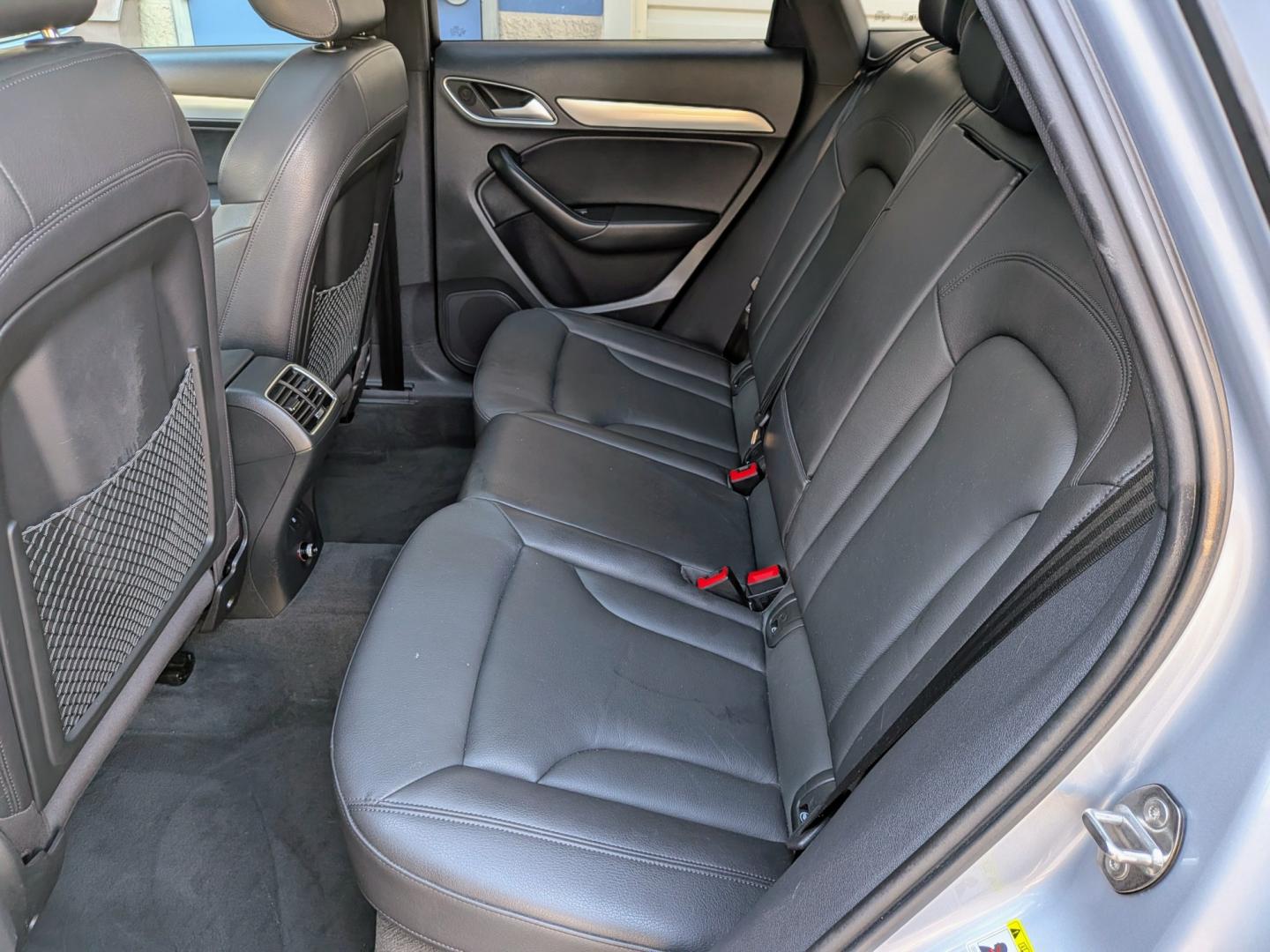 2018 Silver Metallic /Black Leather Audi Q3 Premium Plus quattro (WA1JCCFS1JR) with an 2.0L L4 DOHC 24V engine, 6A transmission, located at 603 Amelia Street, Plymouth, MI, 48170, (734) 459-5520, 42.378841, -83.464546 - Vehicles shown by appointment - Please call ahead - 734-459-5520, text 734-658-4573 or contact us via our web site at: http://www.selectmotors.com for complete Inventory, Photos, Videos and FREE Carfax Reports. 2018 Audi Q3 Premium Plus AWD (S Line Sport) Price: $12,995 (Includes Document Fee &- Photo#5