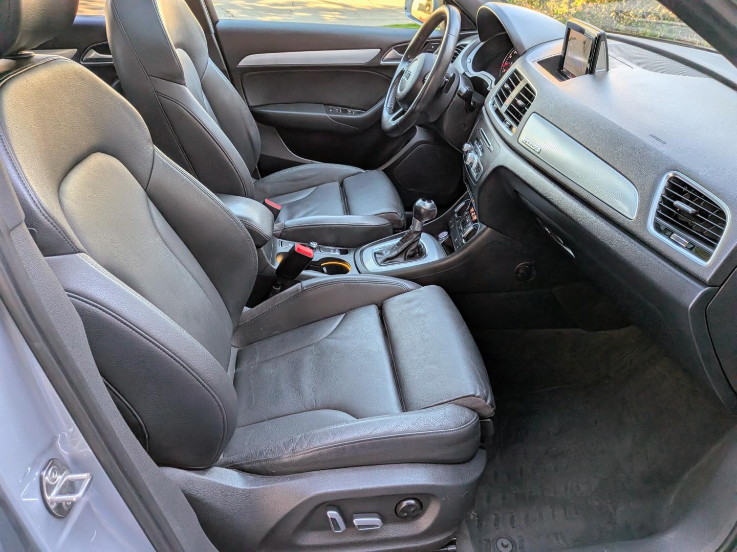 2018 Silver Metallic /Black Leather Audi Q3 Premium Plus quattro (WA1JCCFS1JR) with an 2.0L L4 DOHC 24V engine, 6A transmission, located at 603 Amelia Street, Plymouth, MI, 48170, (734) 459-5520, 42.378841, -83.464546 - Vehicles shown by appointment - Please call ahead - 734-459-5520, text 734-658-4573 or contact us via our web site at: http://www.selectmotors.com for complete Inventory, Photos, Videos and FREE Carfax Reports. 2018 Audi Q3 Premium Plus AWD (S Line Sport) Price: $12,995 (Includes Document Fee &- Photo#8