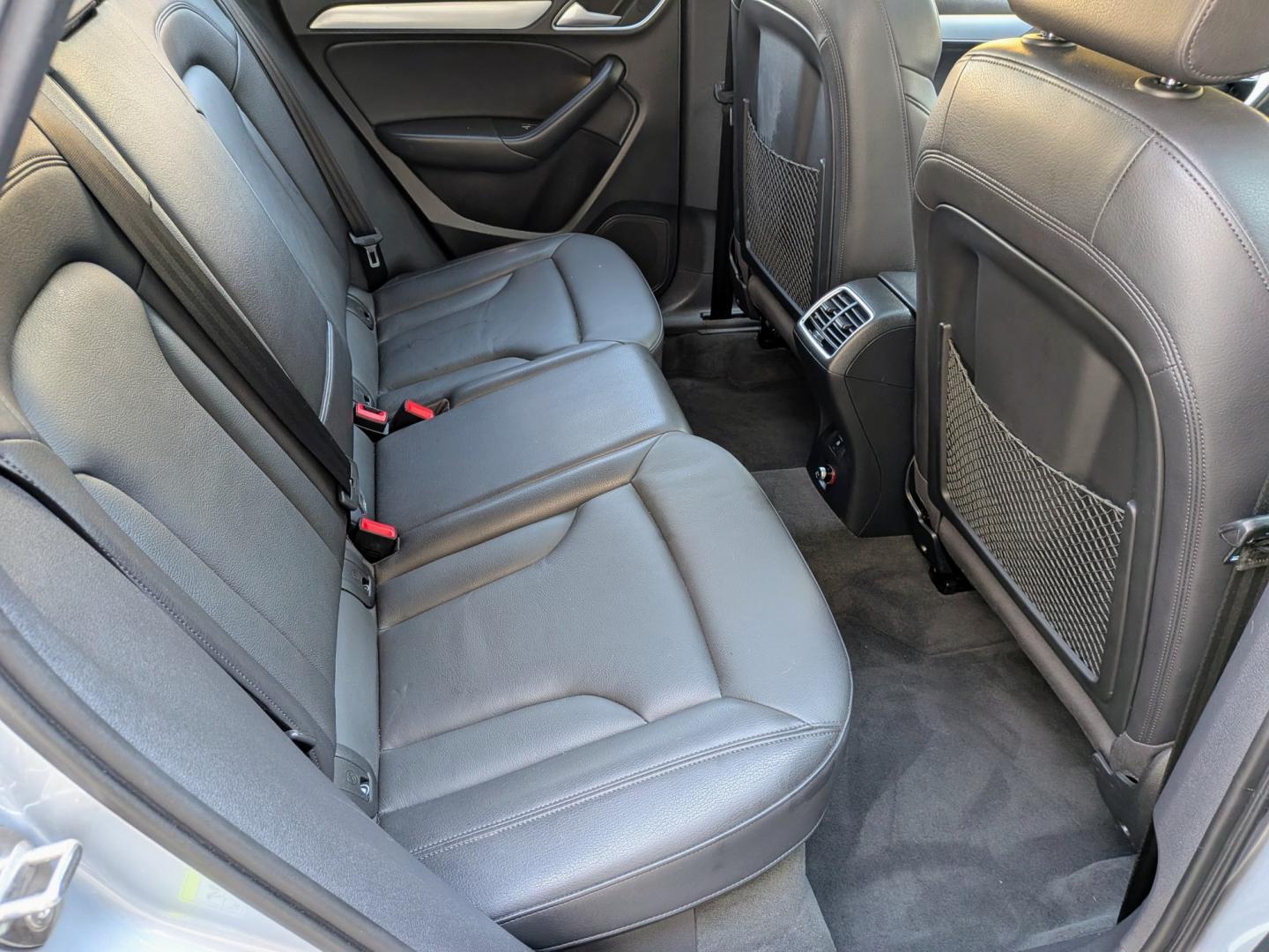 2018 Silver Metallic /Black Leather Audi Q3 Premium Plus quattro (WA1JCCFS1JR) with an 2.0L L4 DOHC 24V engine, 6A transmission, located at 603 Amelia Street, Plymouth, MI, 48170, (734) 459-5520, 42.378841, -83.464546 - Vehicles shown by appointment - Please call ahead - 734-459-5520, text 734-658-4573 or contact us via our web site at: http://www.selectmotors.com for complete Inventory, Photos, Videos and FREE Carfax Reports. 2018 Audi Q3 Premium Plus AWD (S Line Sport) Price: $12,995 (Includes Document Fee &- Photo#9